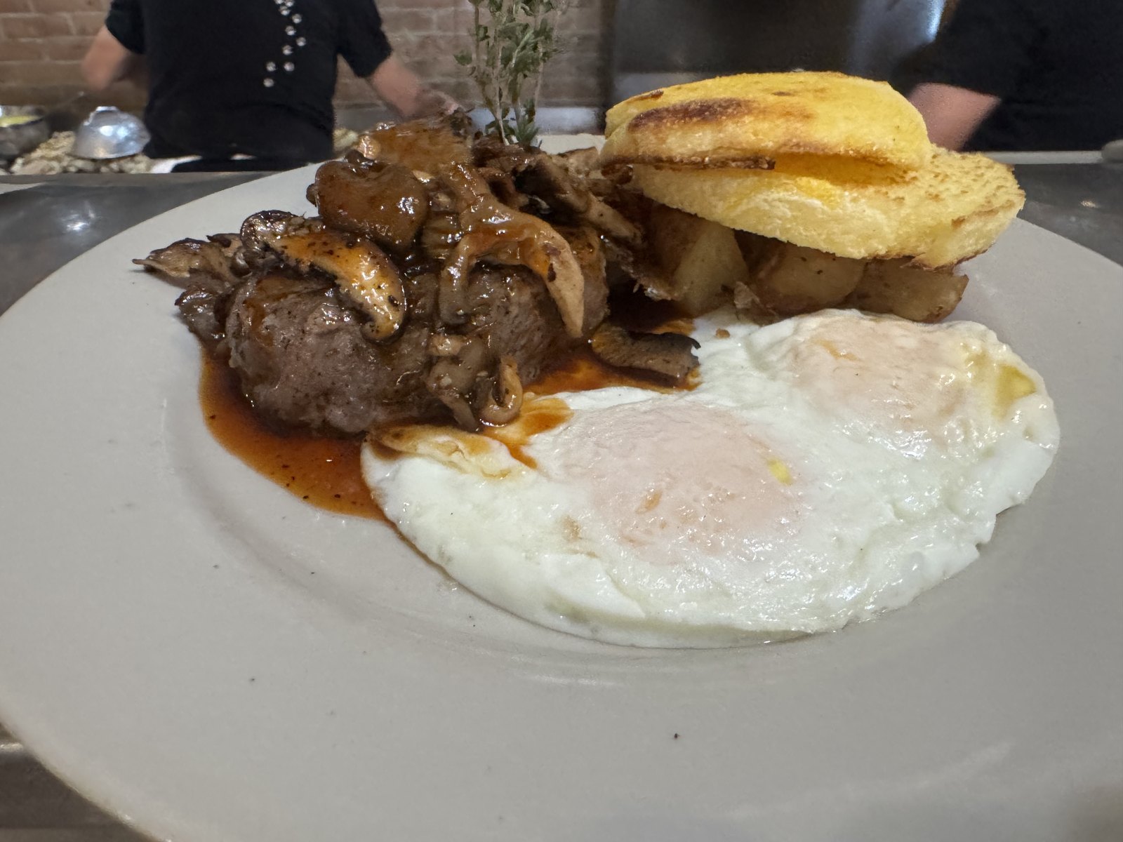 Steak and eggs with mushrooms and toast